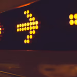 Coloured lights in the shape of arrows