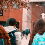 Students wearing backpacks