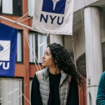 Group of people standing outside building