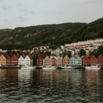 Buildings and boats next to a body of water