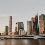 Skyscrapers, a bridge and a river