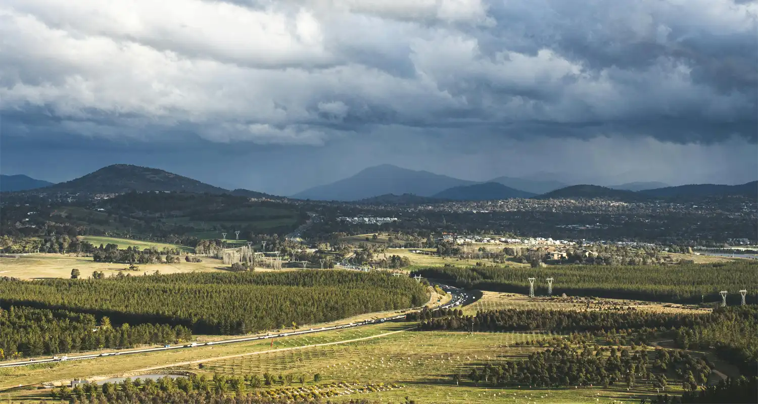 Rolling hills and grassy fields.