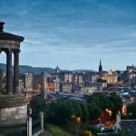 Image of the Edinburgh skyline with trees and old buildings dotted around