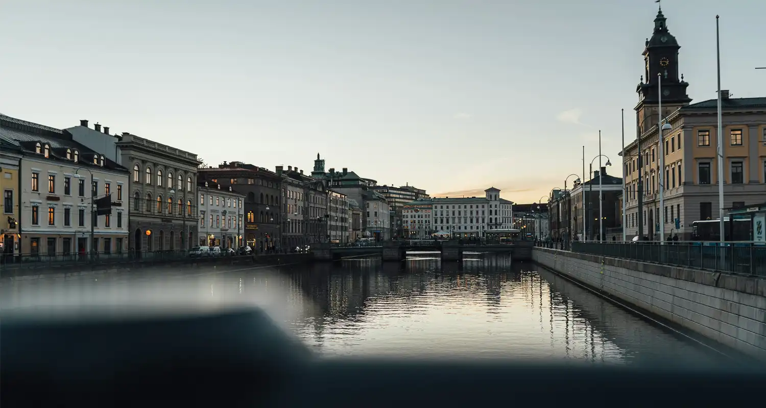 Image of buildings either side of river