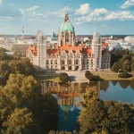 City skyline with a large cathedral style building in the foreground