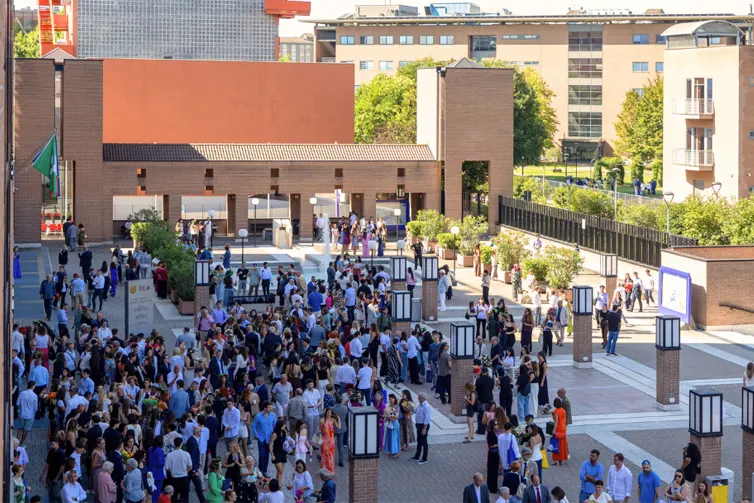 Students on campus in a courtyard.
