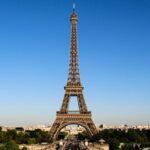 Image of the Eiffel Tower with a blue sky in the background