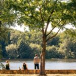 Image of several people looking out over a body of water