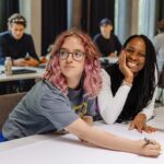 Two students sitting at a desk