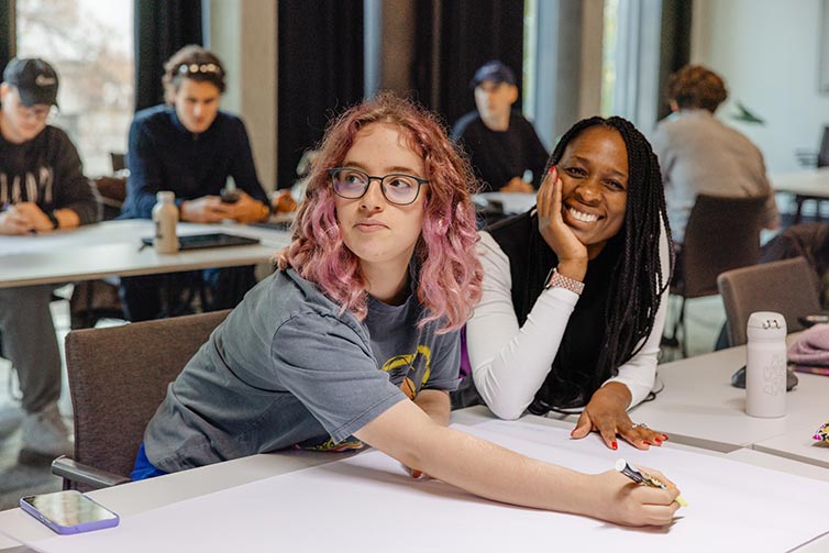 Two students sitting at a desk