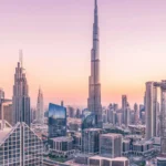 Hi-rise buildings and skyscrapers next to a body of water