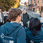 Students wearing university hoodies