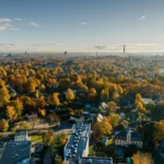 City skyline dotted with buildings and trees