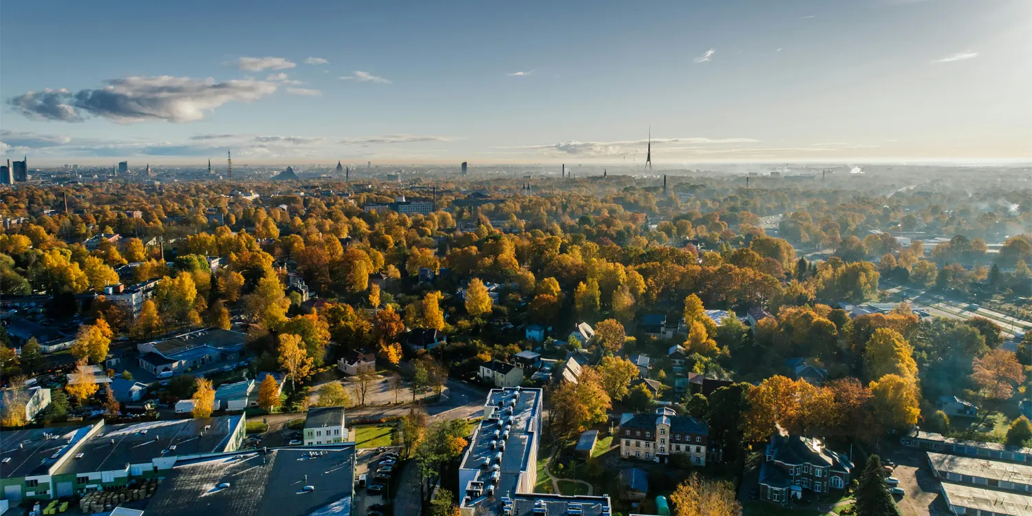 City skyline dotted with buildings and trees