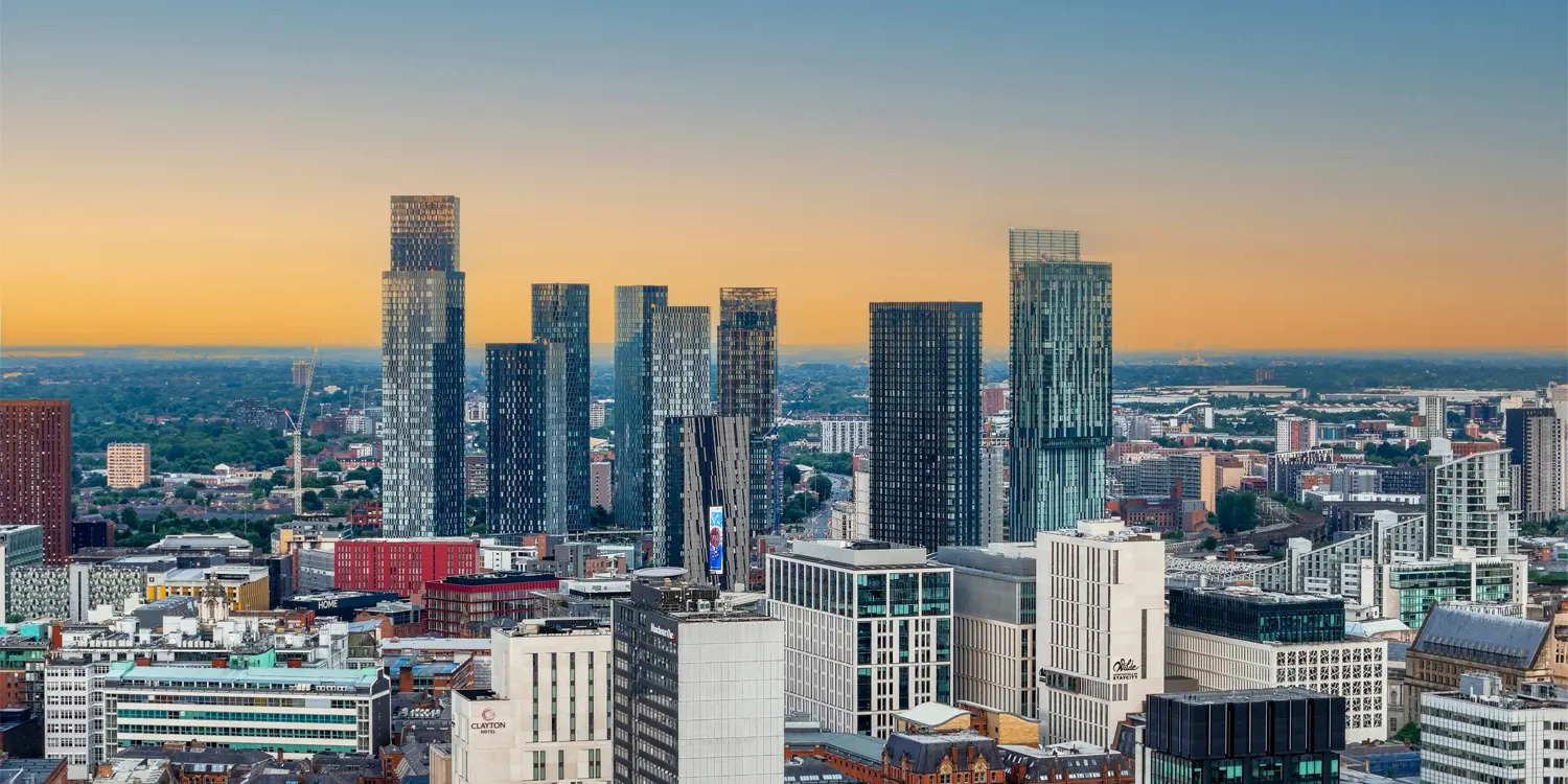 City skyline with tall buildings in the middle of the image
