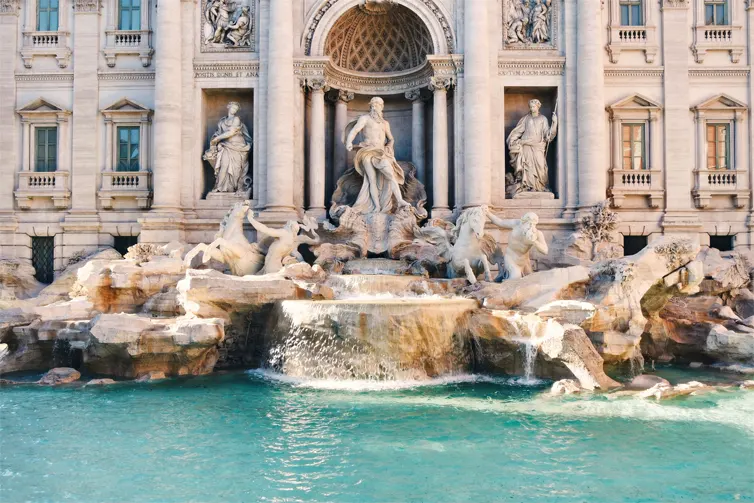 A fountain with intricate statues and designs.