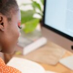 Image of a student looking at a computer screen