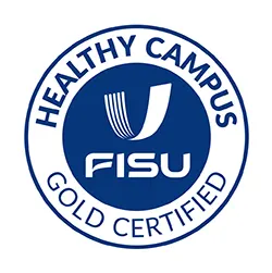 An image that has the words 'healthy campus gold certified' around the outside of a circle badge that says 'FISU' in the centre