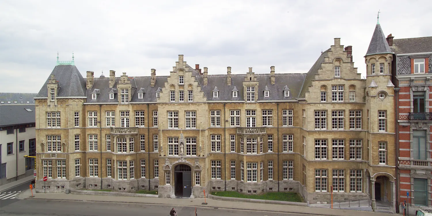 Sandstone coloured building in a typical Belgian style